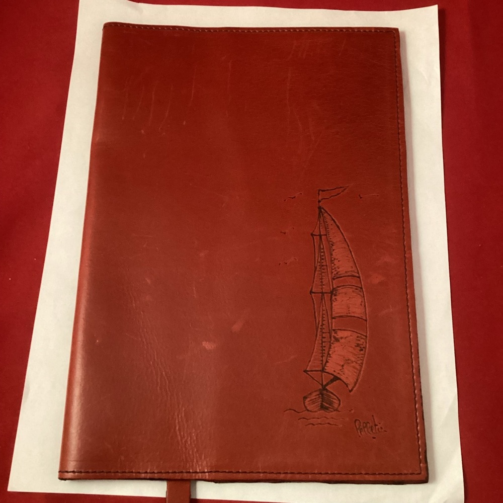 Leather cover for a book or a notebook